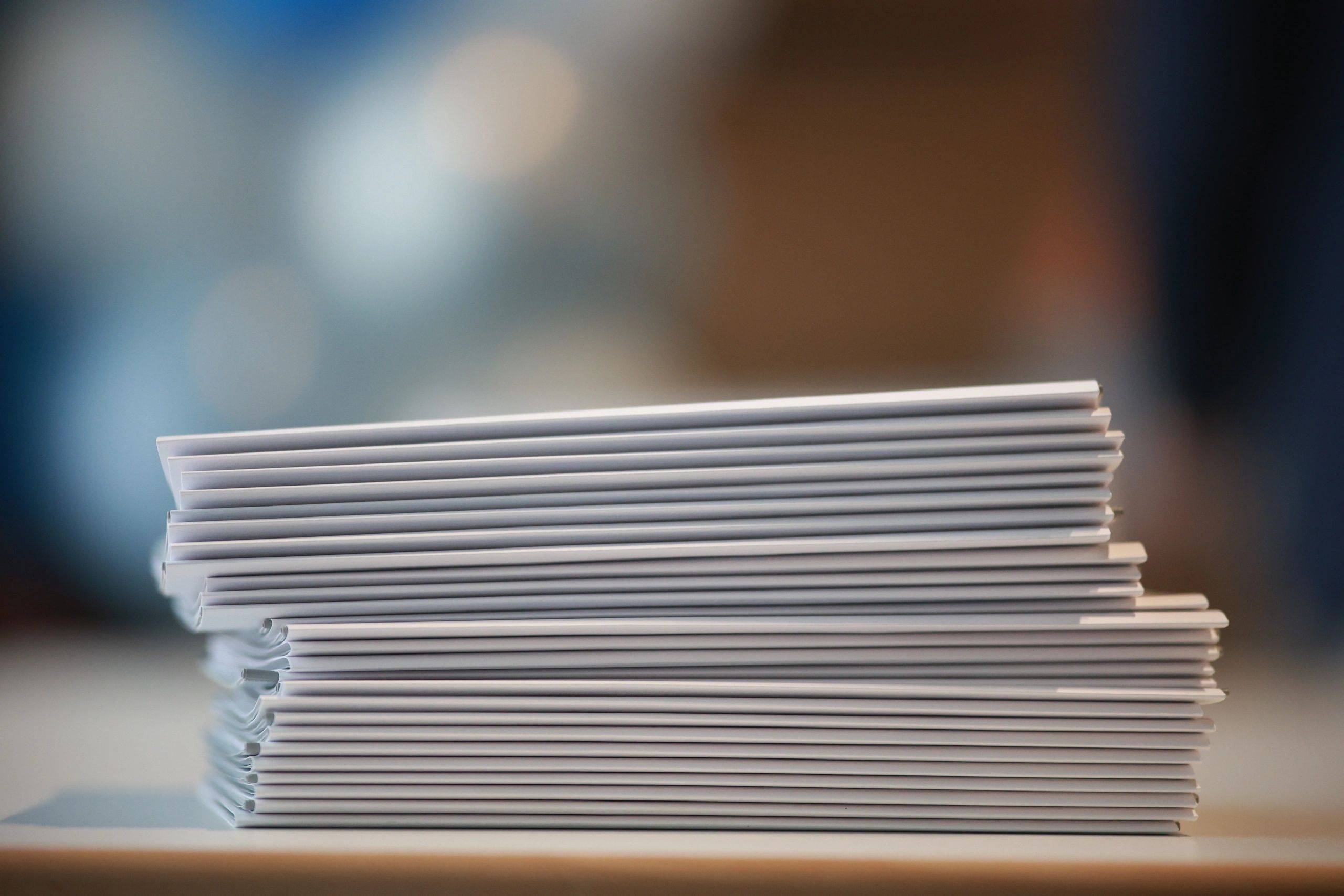 Stack of papers representing editorial research and reporting